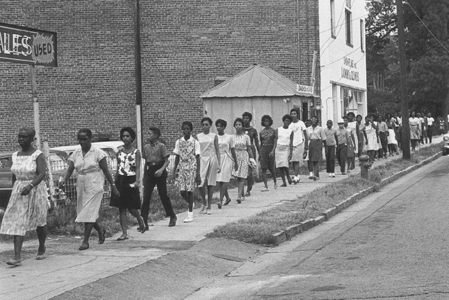 “Freedom marchers in downtown Orangeburg, Aug 23, 1963." Williams. Freedom &amp; Justice, page 210.