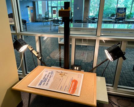 a copystand setup, with 2 light sources, for photographing larger documents and objects